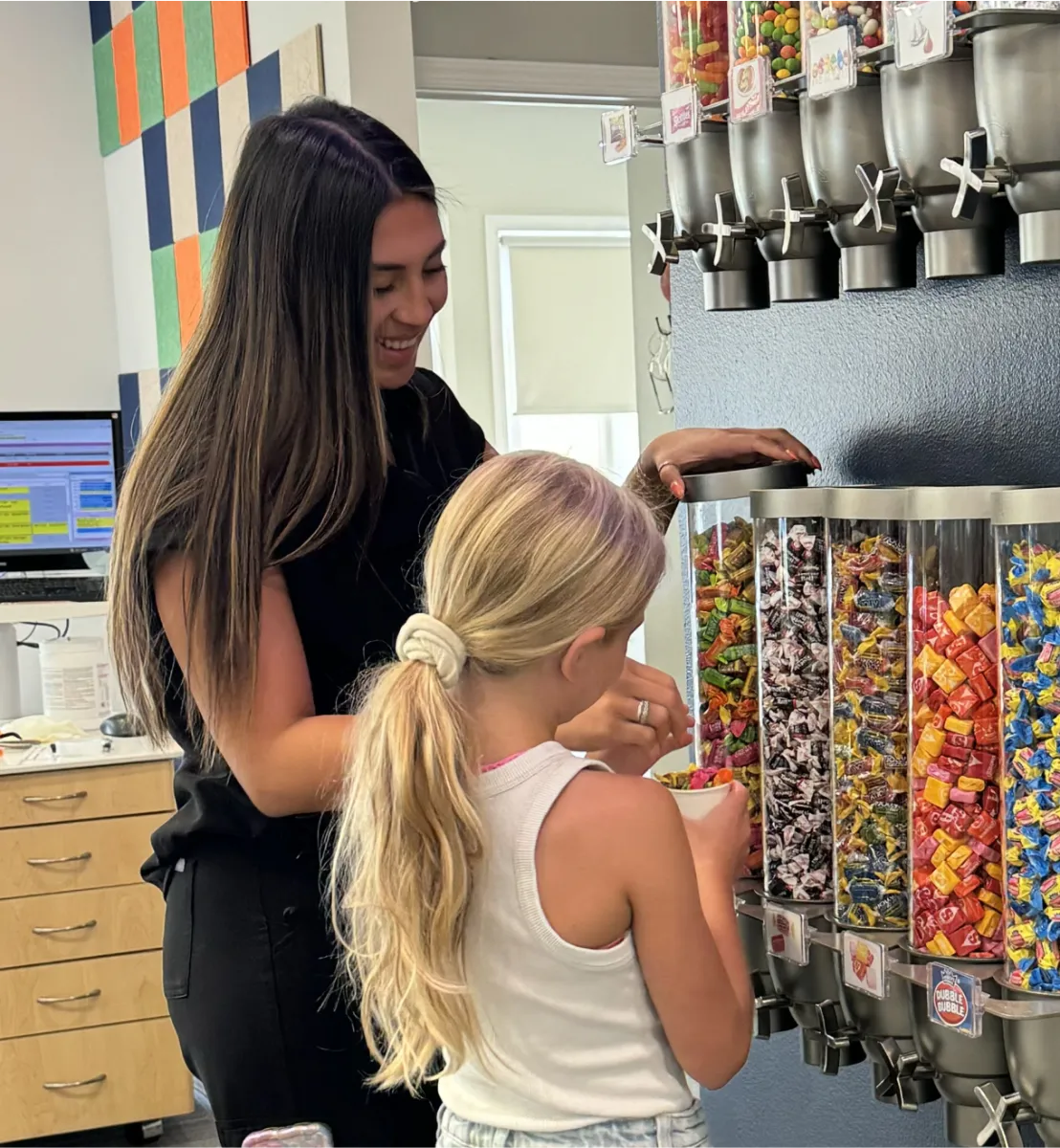 Younis Orthodontics patients with candy